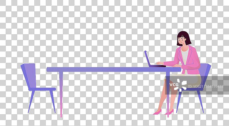 在办公桌前用笔记本电脑工作的女人图片素材