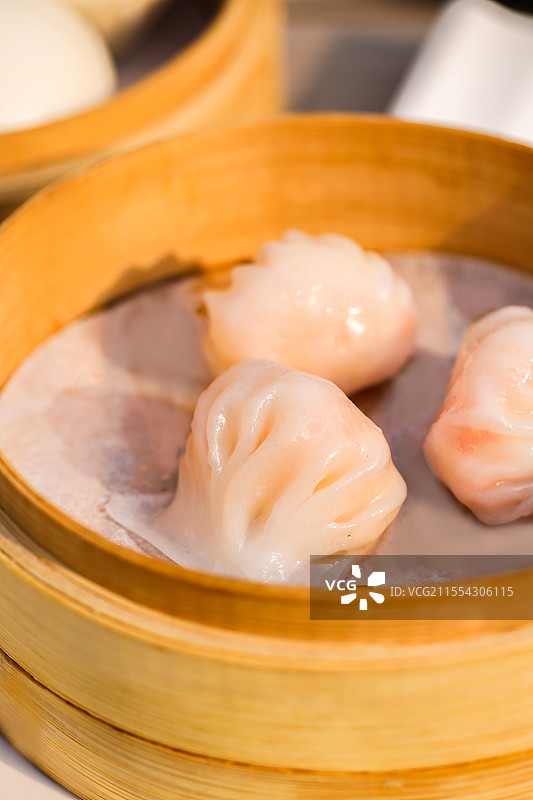 烟火气广式小吃手工虾饺虾饺皇水晶虾饺饺子粤式点心蒸点蒸笼茶点流沙包黑松露菌饺目鱼饺鱼子虾饺福袋图片素材