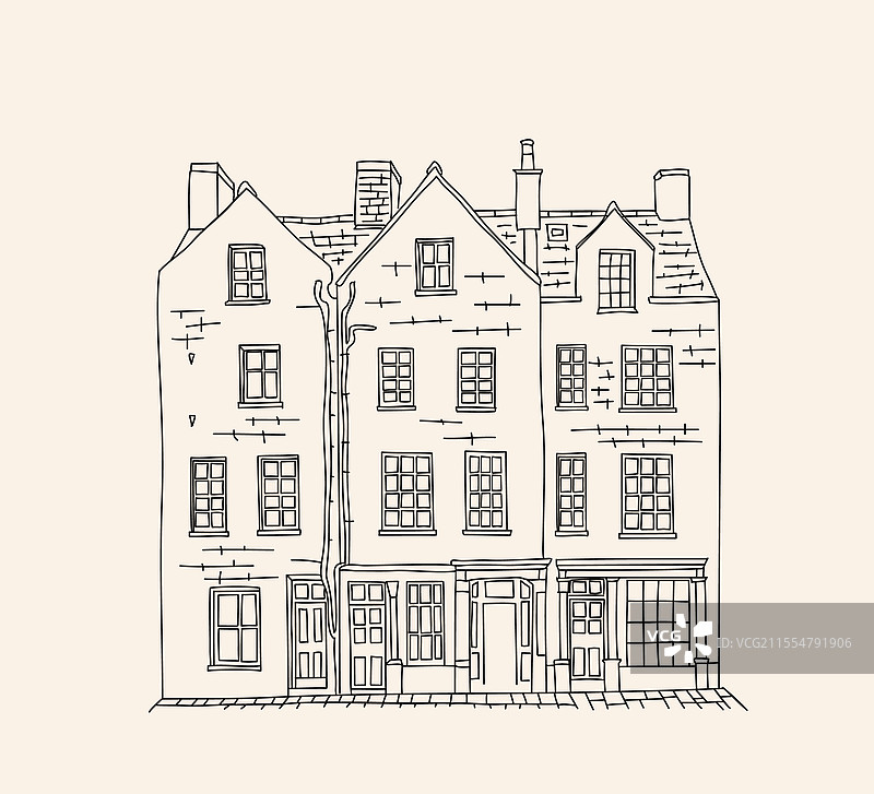 老城区街道上的大型建筑，带有窗户图片素材