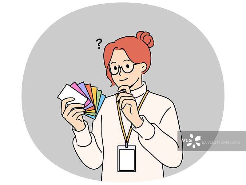女设计师手持不同颜色的调色卡图片素材