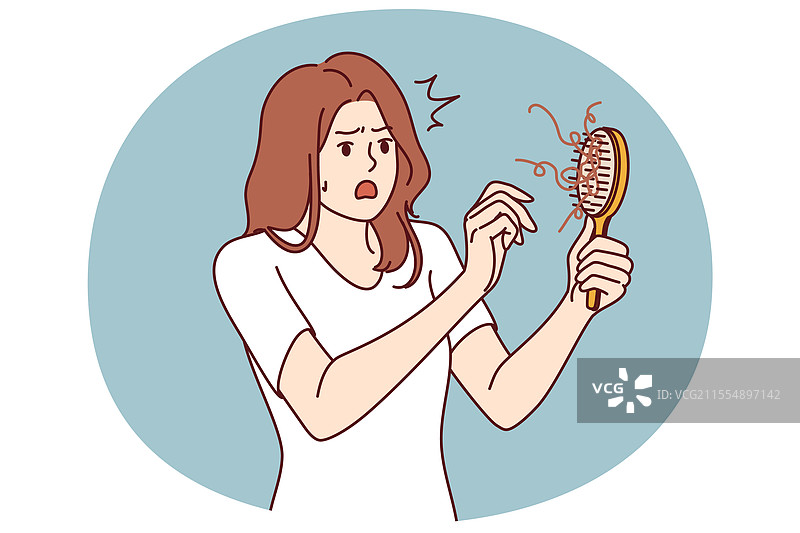 震惊的女性得知脱发问题图片素材