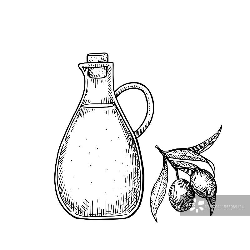 装有橄榄油的玻璃瓶和一枝橄榄枝图片素材