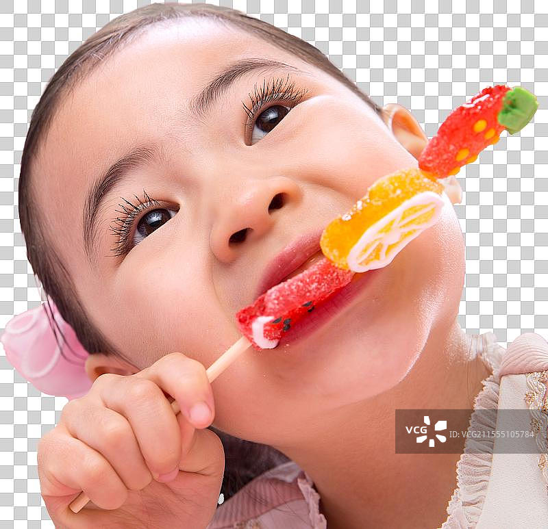 可爱的小女孩吃棒棒糖图片素材