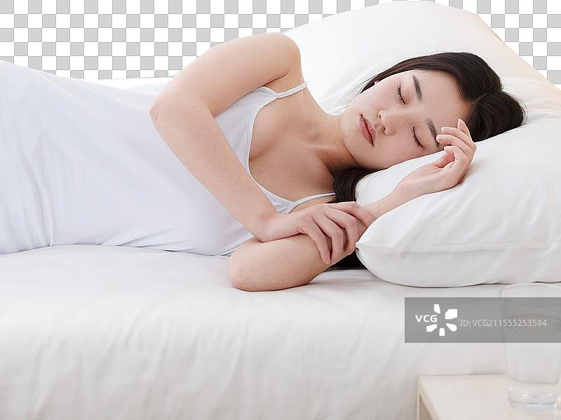 青年女人在卧室睡觉图片素材