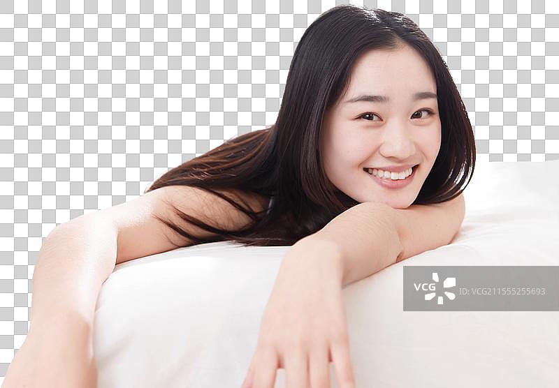 青年女人在卧室的床上图片素材