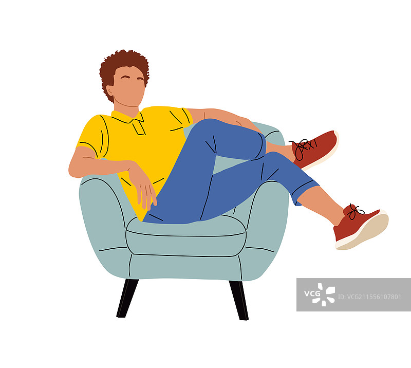 年轻男子坐在扶手椅上，双腿交叉。图片素材