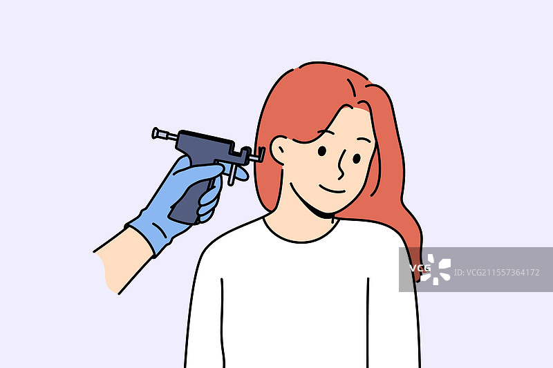 靠近正在参观的女性的耳洞穿刺机图片素材