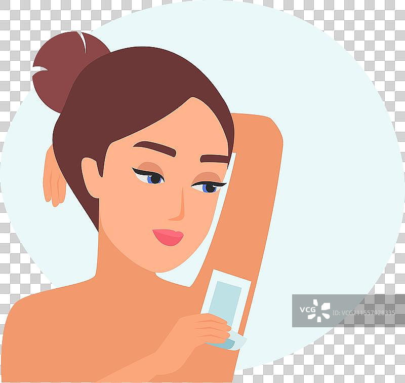 女孩使用蜡条脱腋毛图片素材