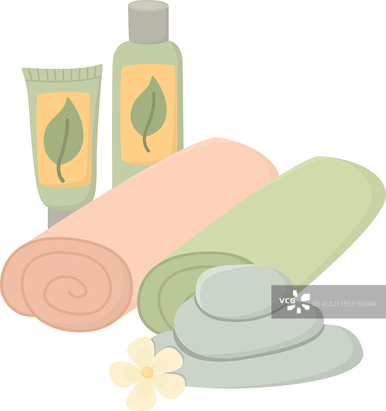 折叠的毛巾、spa石头和化妆品瓶图片素材