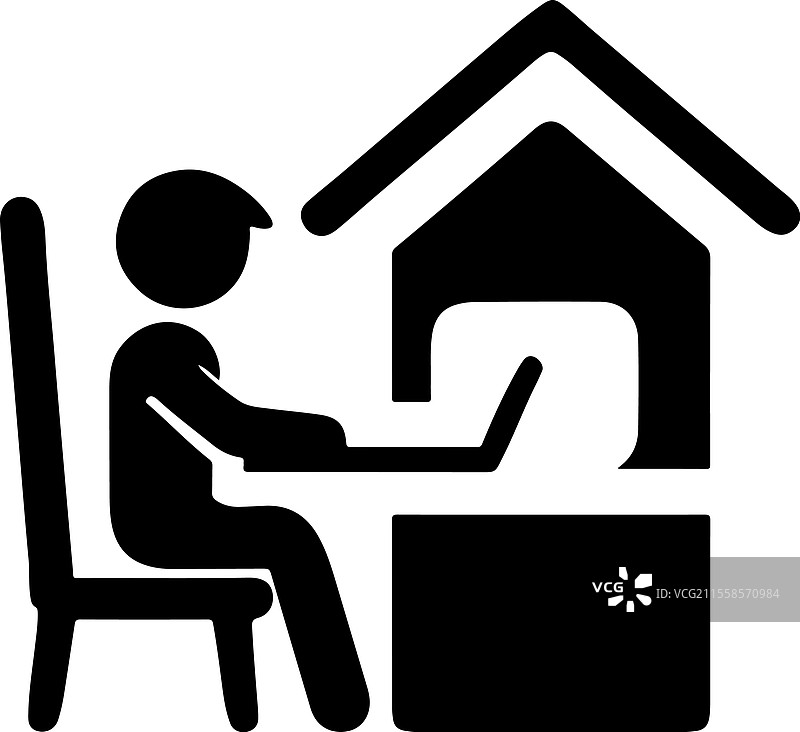 在家办公的人坐在桌子前使用笔记本电脑图片素材