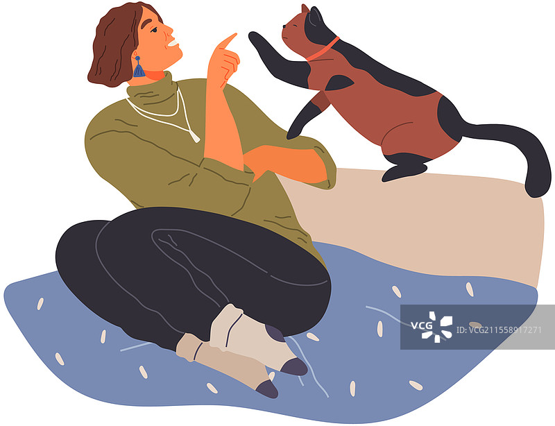 女性宠物主人坐在床上与猫咪玩耍。关爱动物，与宠物共同度过时光的概念。快乐的女士与小猫，家庭动物，人类伴侣。女孩与小猫在家中度过时光。图片素材