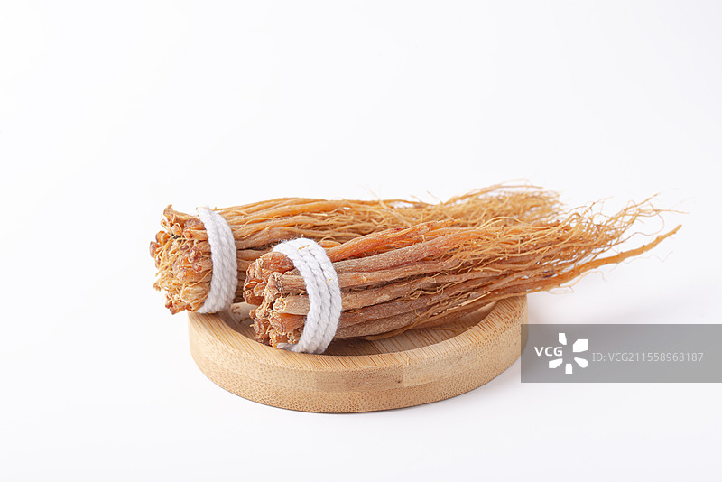 棚拍白底静物中药材人参参须图片素材
