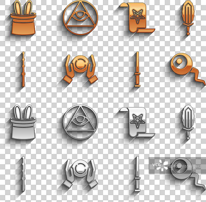 将魔法球放在手中，剑在火焰中，魔杖在眼前。图片素材