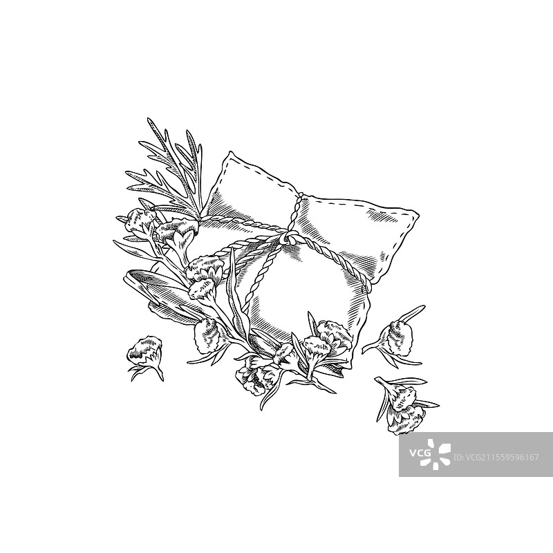艾蒿植物和刻有图案的精油香囊图片素材
