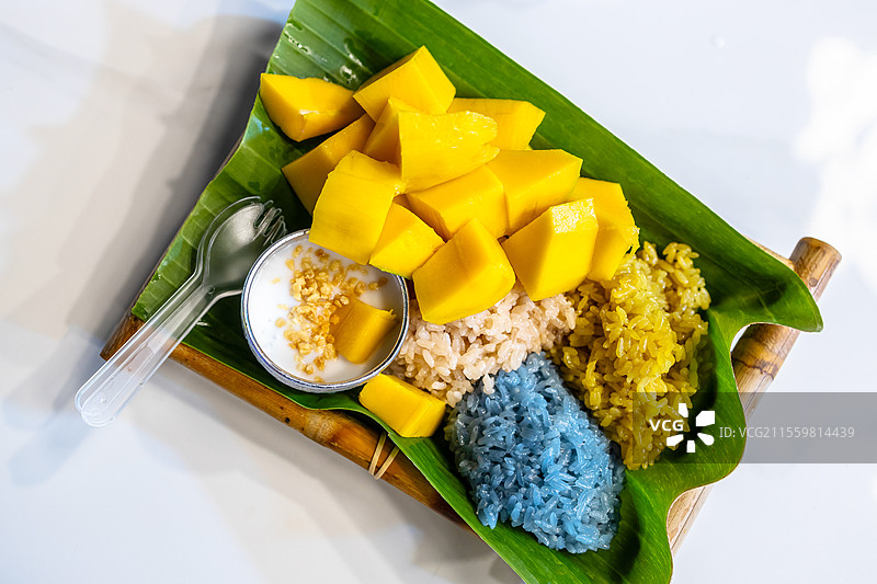西双版纳美食芒果糯米饭图片素材