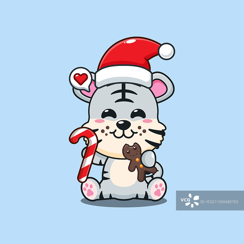 可爱的白虎在吃圣诞饼干图片素材