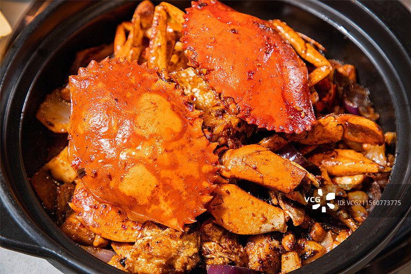 粤菜香辣蟹肉蟹煲大螃蟹蟹钳蟹腿螃蟹年糕图片素材