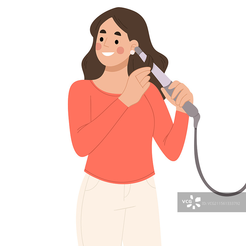 女人用卷发器打理头发图片素材