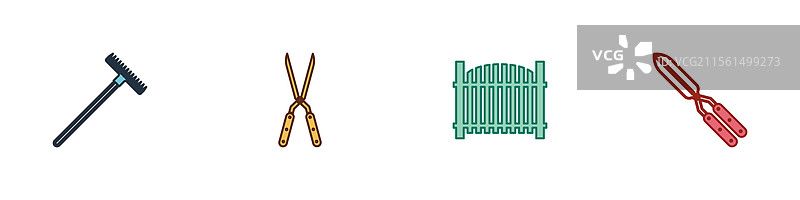 园艺工具：手工制作的园艺耙、剪刀和围栏图片素材