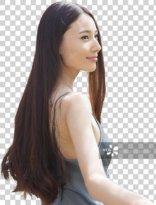 青年女人站在阳台往外看图片素材