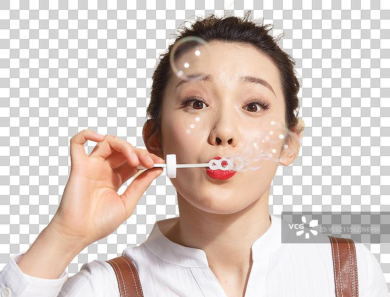 青年女人吹泡泡图片素材