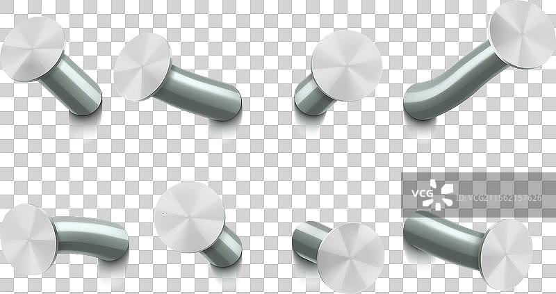 一组金属钉子钉在墙上弯曲图片素材