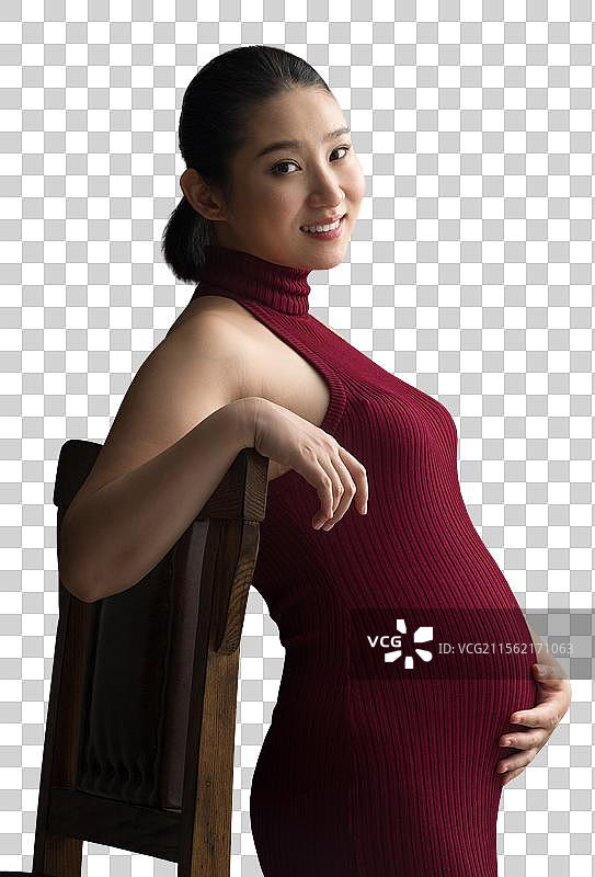 孕妇抚摸肚子图片素材