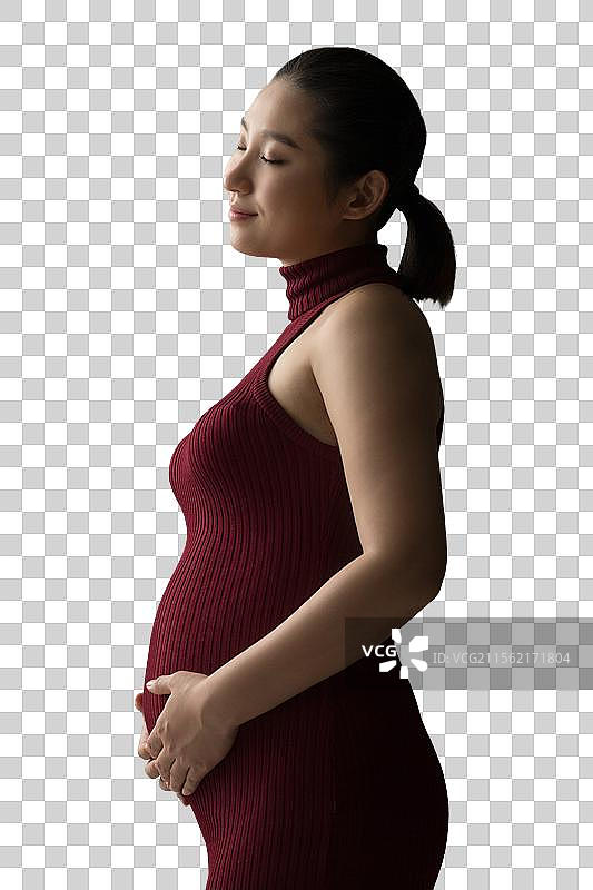 孕妇抚摸肚子图片素材