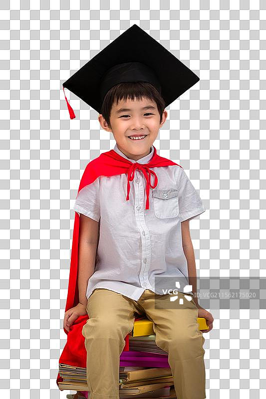 戴着学位帽的小学男生图片素材