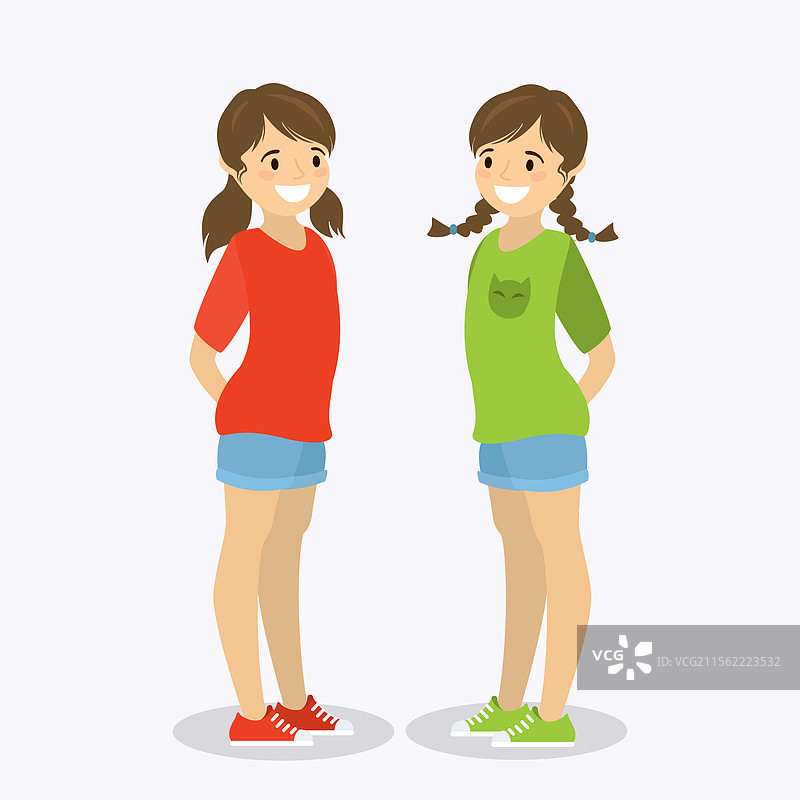 两个快乐的少女双胞胎，发型各异图片素材