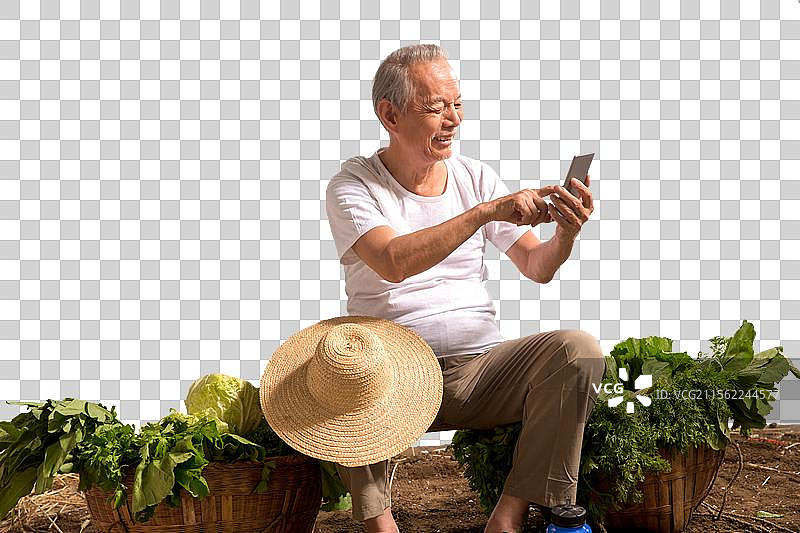 菜农在拿着手机图片素材