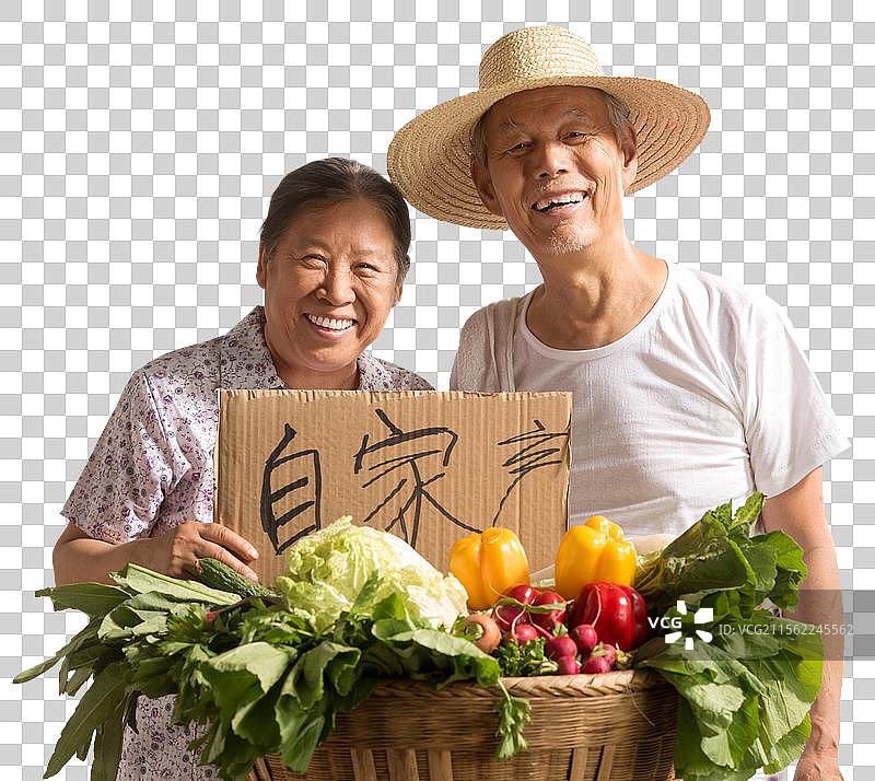 农民夫妇出示自家蔬菜图片素材