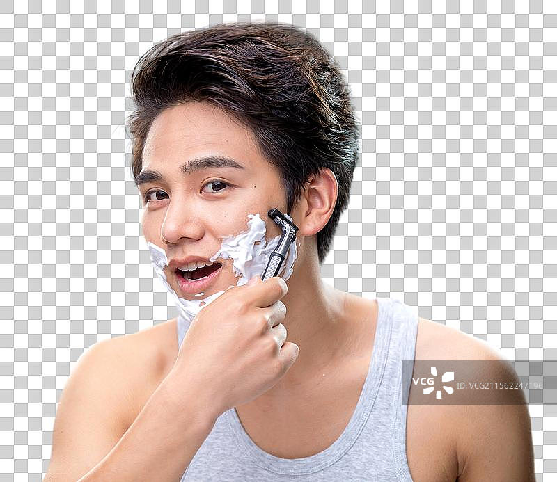 帅气的年轻男人刮胡子图片素材