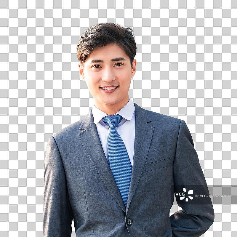 商务男士站在办公楼前图片素材