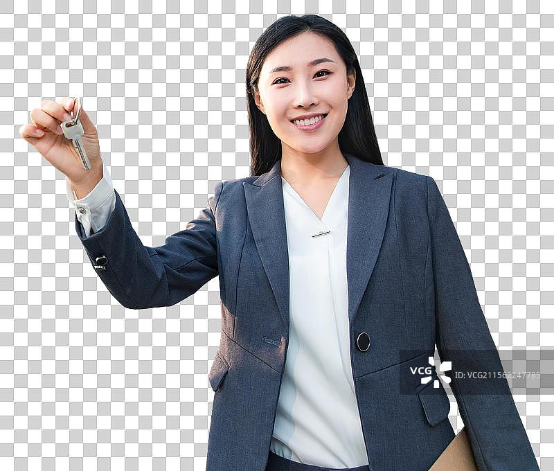 青年销售人员拿着钥匙图片素材