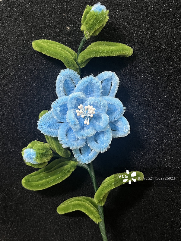 蓝色扭扭棒山茶花图片素材