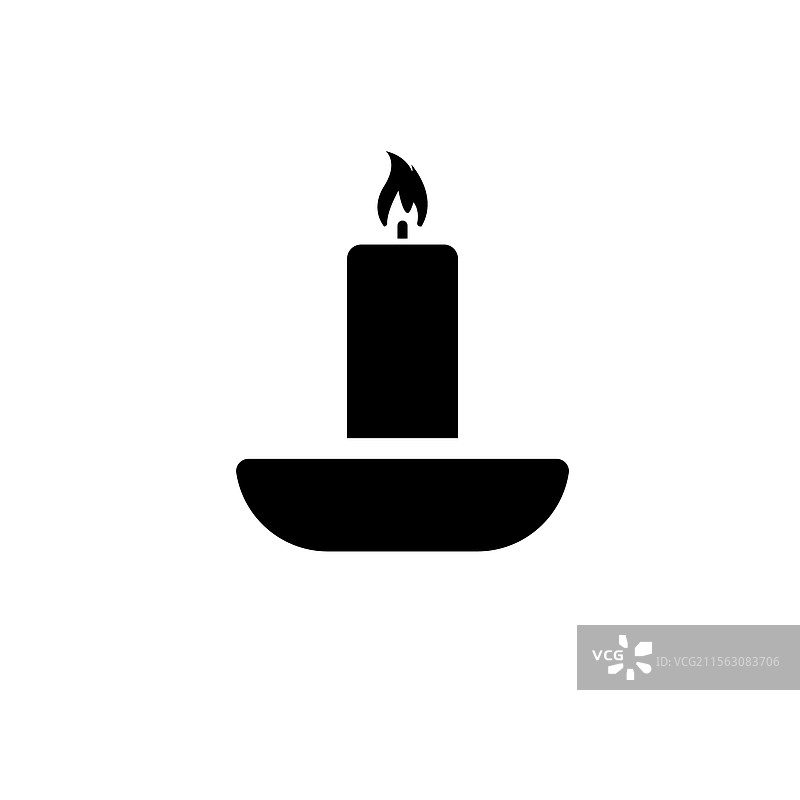 圣诞节点燃的蜡烛和烛台图片素材