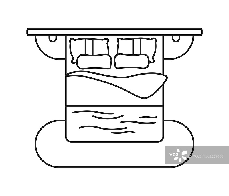 特大号床的俯视图，配有枕头和床头柜图片素材