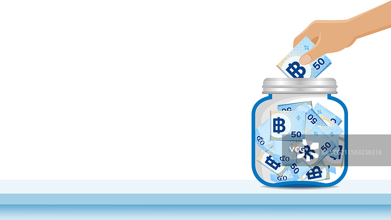 手中握着的50泰铢纸币与玻璃瓶图片素材