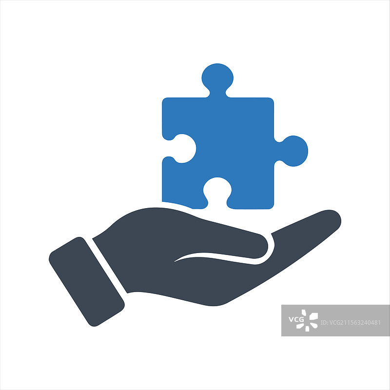 手中握着拼图块的拼图图标图片素材