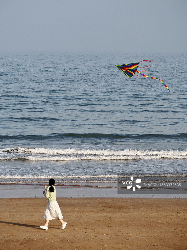 海边放风筝图片素材