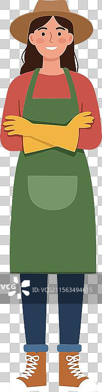 穿着绿色围裙和黄色手套的女人在公寓里图片素材