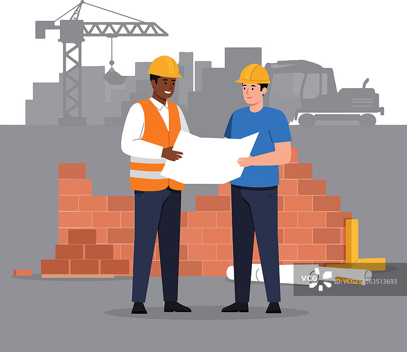 建筑工人合作绘制蓝图图片素材