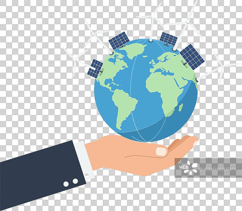 一只手握着一个带有太阳能电池板和风力发电机的地球仪图片素材