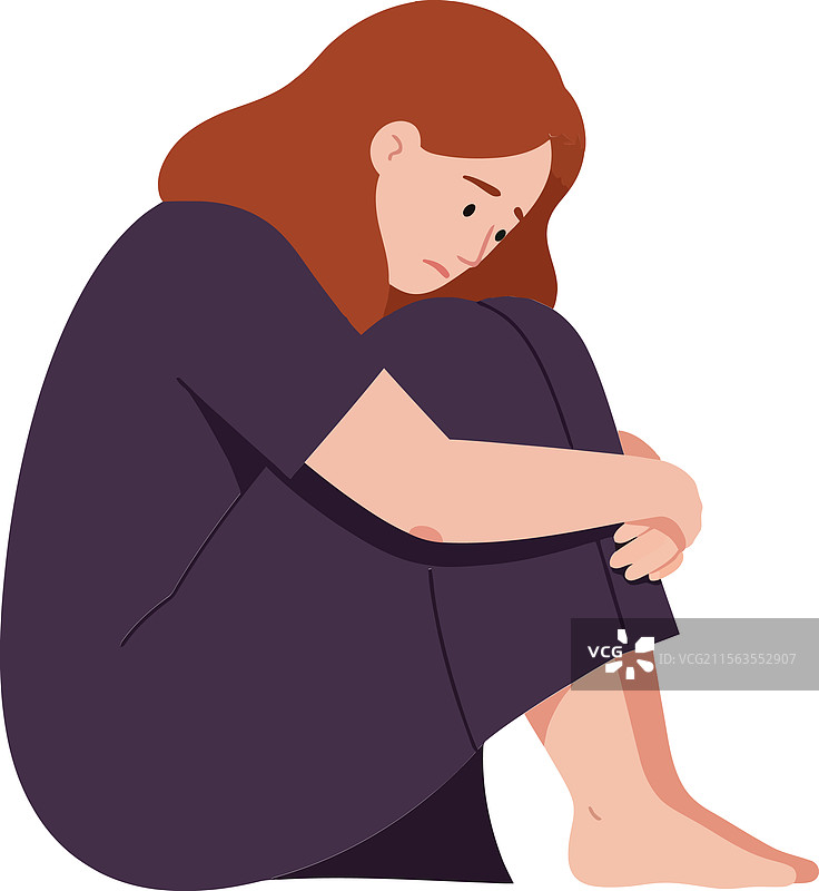 女人坐在地板上抱着膝盖图片素材