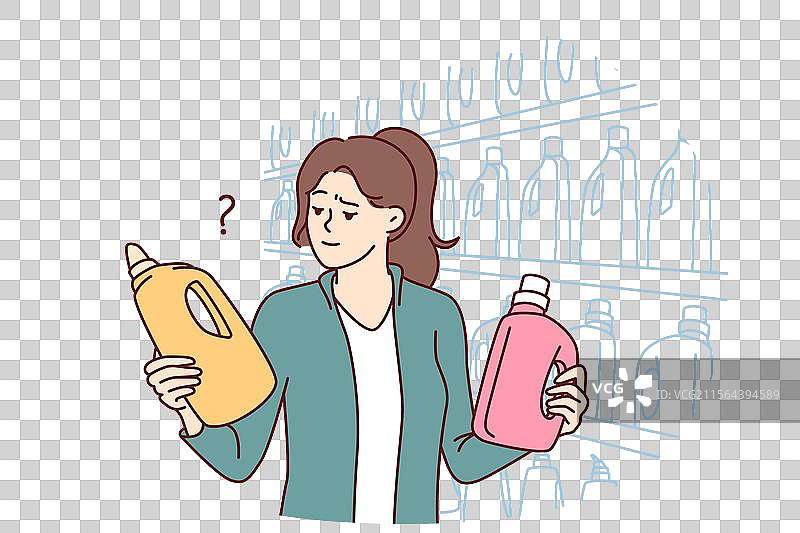 女人手持洗衣液瓶图片素材