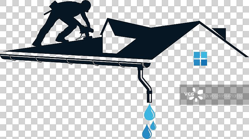 屋顶工人在房屋顶部修理时使用工具图片素材