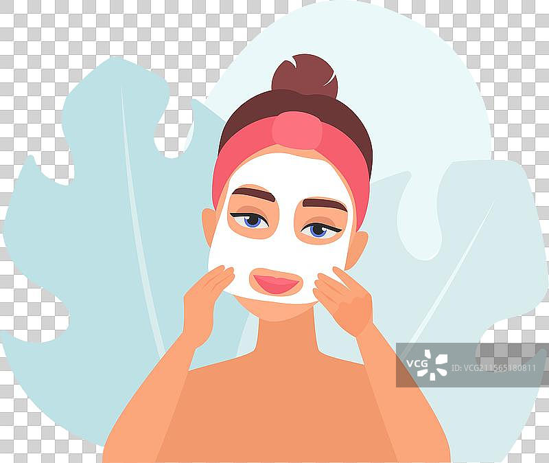 女孩正在卸妆，去除抗衰老保湿霜图片素材