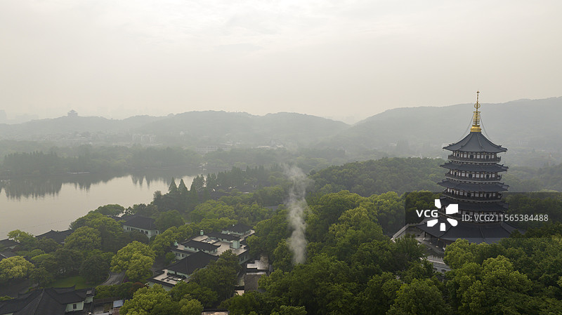 杭州西湖雷峰塔地标建筑水墨画风格摄影图片素材