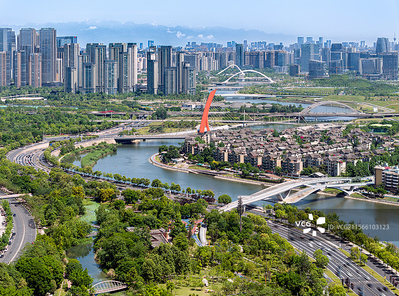 中国四川成都雪山下的锦江两岸城市风光航拍图图片素材
